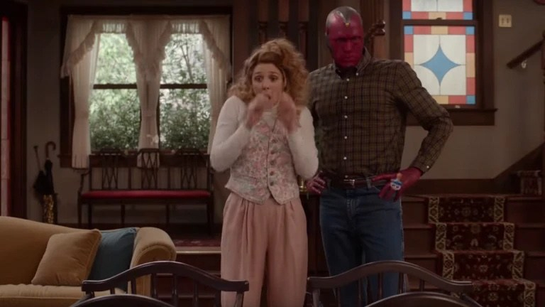 Wanda and Vision looking at their twin baby cradles as seen in Episode 5 of WandaVision.