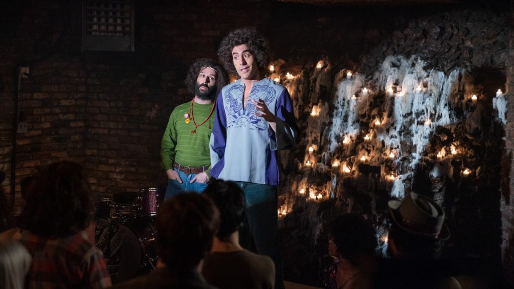 Sacha Baron Cohen as Abbie Hoffman as seen in The Trial of the Chicago 7 on Netflix.
