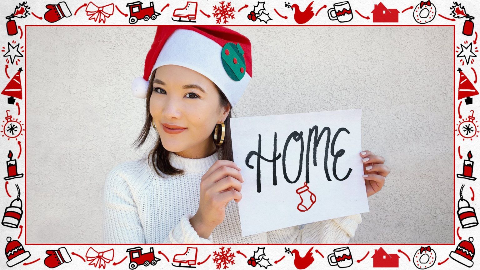 Actress Ally Maki wearing a Santa Claus hat and posing for a photo while promoting the new Disney+ exclusive Home Alone sequel HOME SWEET HOME ALONE.