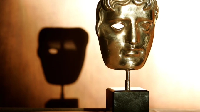 The esteemed golden actor mask statue handed out to the winners at the 2022 BAFTAs!