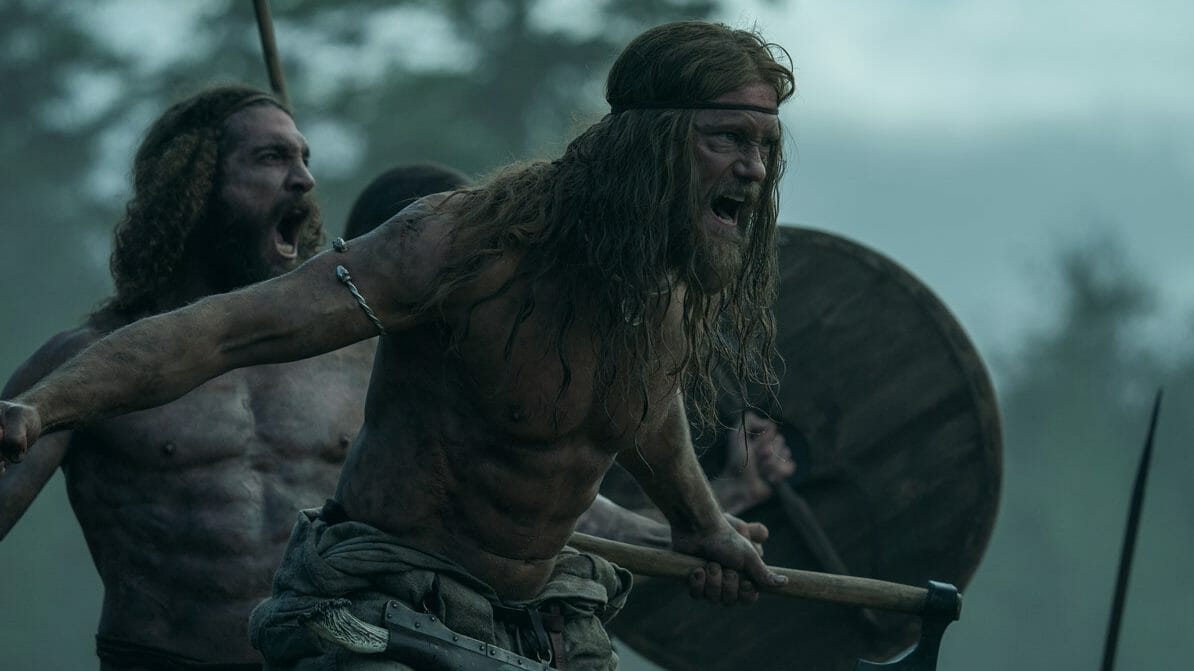 ‘The Northman’ Review – Fiery Hot and Heartless Alexander Skarsgård screams into battle with his fellow shirtless vikings like a pack of wild animals in THE NORTHAMAN directed by Robert Eggers.
