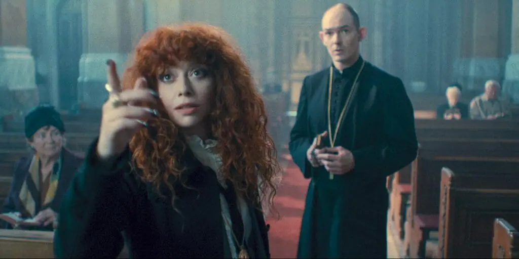Natasha Lyonne as Nadia Vulvokov makes a scene in a church while mass is in session as seen RUSSIAN DOLL season 2 coming to Netflix in April 2022.