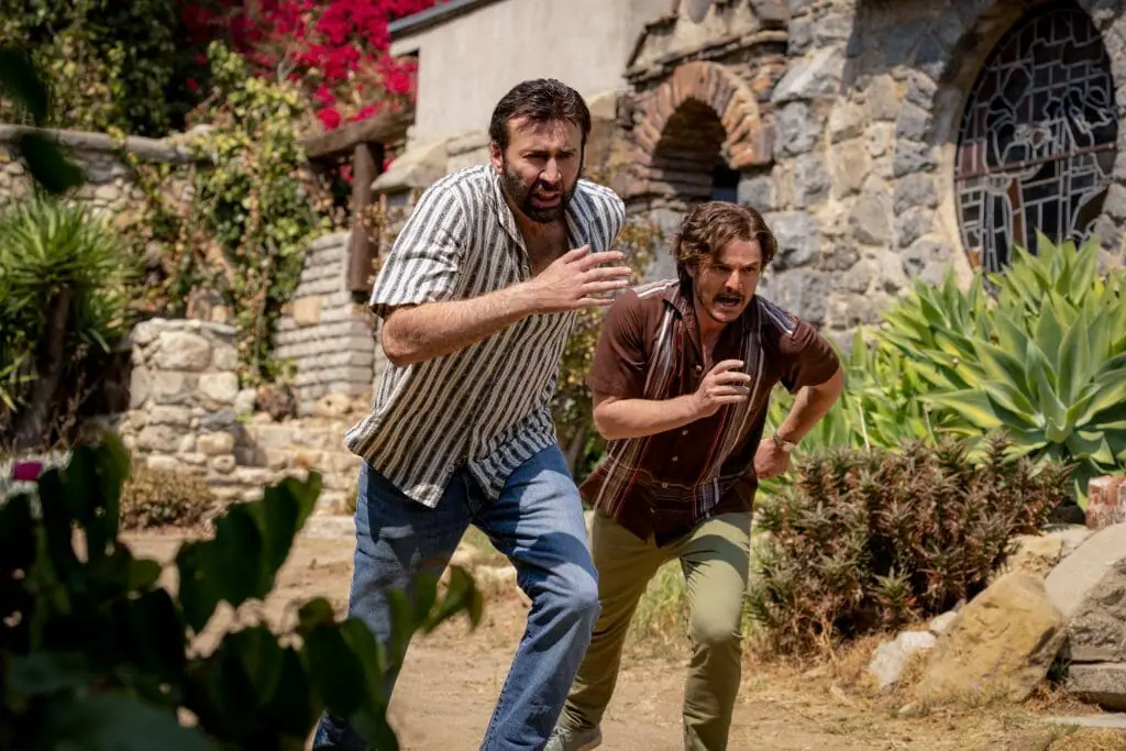 Nicolas Cage and Pedro Pascal run away together hysterically while high on acid in THE UNBEARABLE WEIGHT OF MASSIVE TALENT.