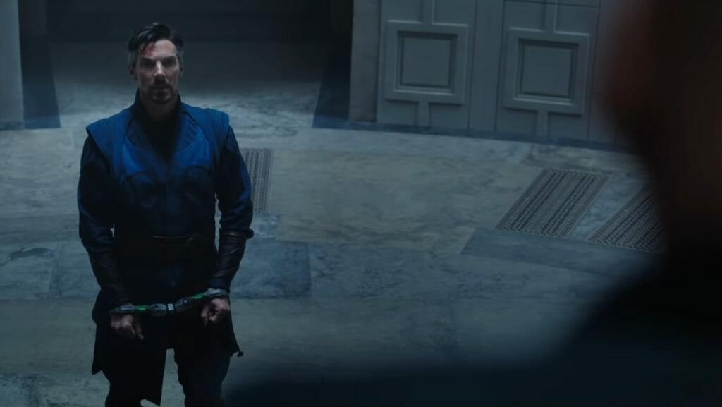 Benedict Cumberbatch as Doctor Strange is handcuffed as he stands trial face to face with Patrick Stewart as Professor X and the Illuminati in DOCTOR STRANGE IN THE MULTIVERSE OF MADNESS written by Michael Waldron.