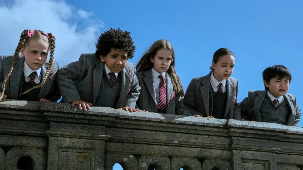 Alisha Weir stars as the titular Matilda with her gang of boarding school friends in Roald Dahl's Matilda the Musical on Netflix.