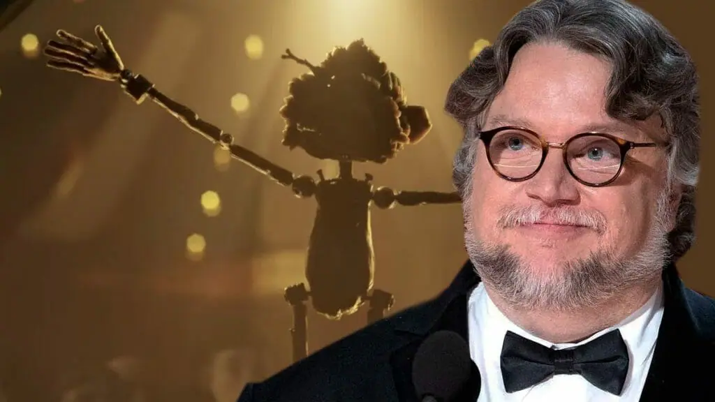 A graphic of director and writer Guillermo del Toro next to his version of Pinocchio bowing on stage after doing a puppet show from the stop motion animated Netflix film.