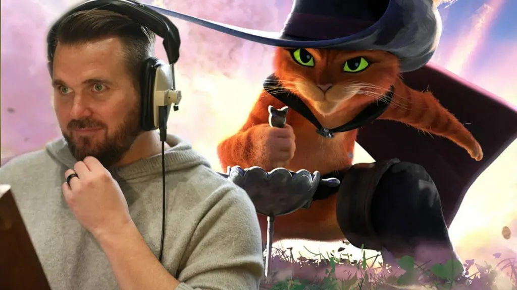 A collage of director Joel Crawford next to Puss in Boots in an epic battle pose with his sword in the DreamWorks animated film PUSS IN BOOTS: THE LAST WISH.