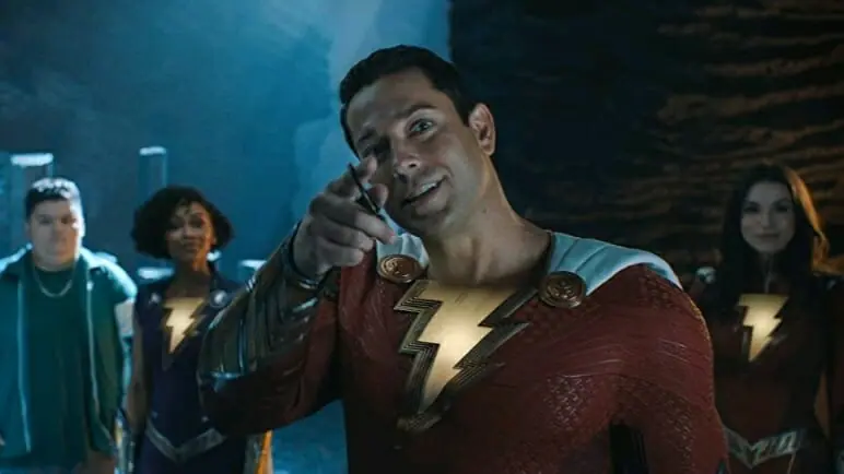 Shazam played by Zachary Levi does some remodeling of the Wizard's ancient throne room alongside the members of the Shazamily in the DC sequel SHAZAM! FURY OF THE GODS.