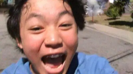 Child actor Izaac Wang plays the young Taiwanese boy Chris filming a video of himself skateboarding in the coming-of-age film Dìdi.