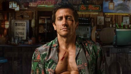 Jake Gyllenhaal strikes a cool pose as former UFC middleweight fighter Elwood Dalton on the official poster for the ROAD HOUSE remake coming to Prime Video in March 2024.