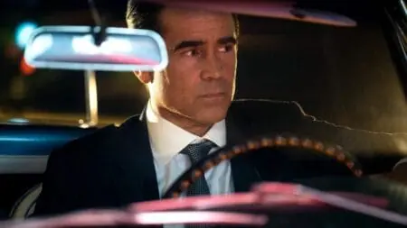 Colin Farrell stars as private investigator John Sugar looking cool while driving his vintage car in the Apple TV+ original series SUGAR.
