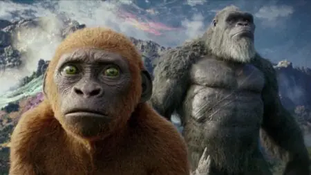 Suko, the orange mini Kong titan, and the original giant Kong walk together in Hollow Earth in GODZILLA X KONG: THE NEW EMPIRE, coming to the Max streaming service in July 2024.
