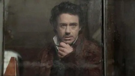 Robert Downey Jr. sports a clean shave and period piece attire in SHERLOCK HOLMES directed by Guy Ritchie, which just got added to the HBO and Max streaming service in August 2024.