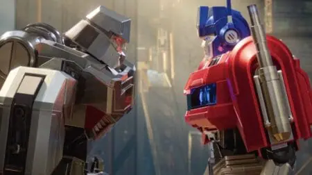 Megatron and Optimus Prime, voiced respectively by Brian Tyree Henry and Chris Hemsworth, square off face to face in the animated film TRANSFORMERS ONE.
