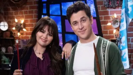 Selena Gomez and David Henrie smile together as they return as Alex and Justin Russo in the Disney Channel revival series WIZARDS BEYOND WAVERLY PLACE.