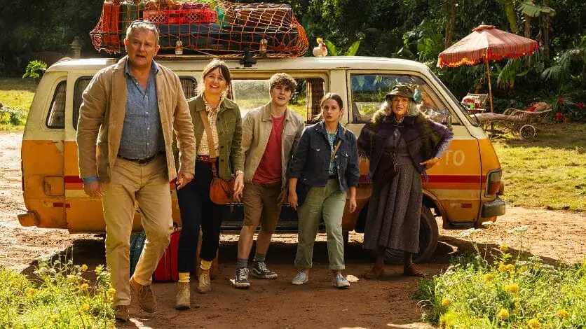 Hugh Bonneville, Emily Mortimer, Samuel Joslin, Madeleine Harris, and Julie Walters star as the Brown family and Mrs. Bird arriving in Peru for the first time with their huge bags of luggage in Paddington 3. 