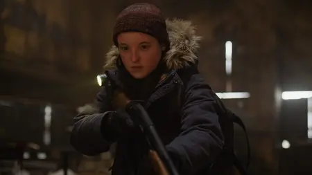 Bella Ramsey returns as the 19 year old Ellie as she prepares to shoot her rifle gun in THE LAST OF US Season 2 on HBO.