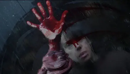 Sally Hawkins rubs her bloody red hand across a dirty glass window in the new A24 horror movie BRING HER BACK.