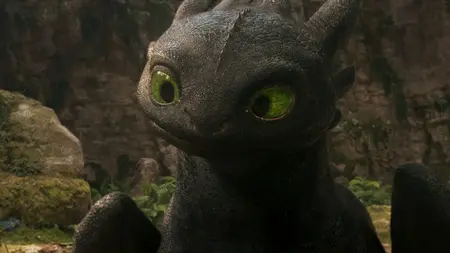 A close-up shot of the legendary black-scaled Night Fury dragon Toothless making a cute and adorable face in the live-action remake of HOW TO TRAIN YOUR DRAGON.