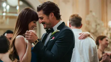 Dakota Johnson and Pedro Pascal share an intimate dance on the dance floor of a fancy wedding the romantic drama A24 film MATERIALISTS.