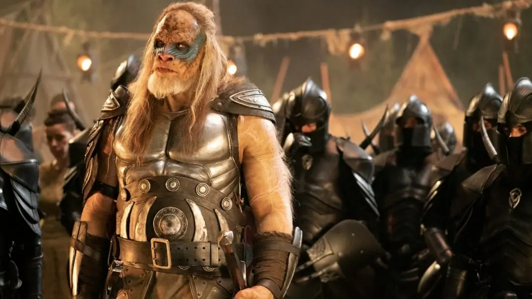 Giant bodybuilder Martyn Ford stars as the baboon man hybrid General Karlak in full facial prosthetic makeup and battle armor in the 2025 RED SONJA live-action remake.  