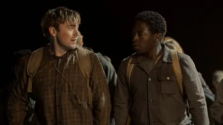 Cooper Hoffman and David Jonsson star as Raymond Garraty and Peter McVries walking side by side looking extremely tired in the 2025 movie adaptation of Stephen King's THE LONG WALK.