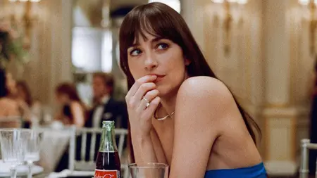 Dakota Johnson stars as top New York City matchmaker Lucy Mason looking gorgeous as she sits at an empty table at a lavish wedding reception in the romantic comedy MATERIALISTS, which is included in the HBO Max November 2025 list of new movies and TV shows.