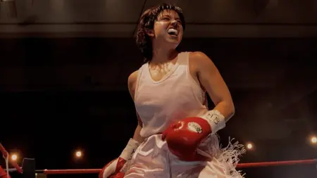 Sydney Sweeney stars as the famous female boxer Christy Martin looking tired and furious during a boxing match in the self-titled biopic CHRISTY.