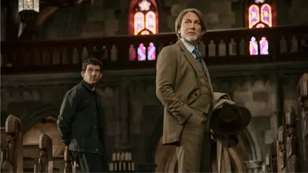 New Arrivals for Netflix December 2025 Daniel Craig stars as private detective Benoit Blanc meeting the kind young priest Jud Duplenticy, played by Josh O'Connor, inside an old Gothic church in WAKE UP DEAD MAN: A KNIVES OUT MYSTERY, which is included in the Netflix December 2025 list of new movies and TV shows.