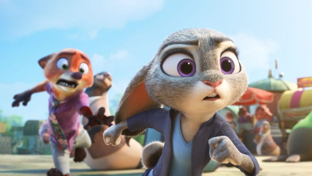 Judy Hopps the bunny chases a suspect down wooden boardwalk with her partner in crime Nick Wilde the fox hilariously trying his best to keep up with her from behind in the animated Disney sequel ZOOTOPIA 2.