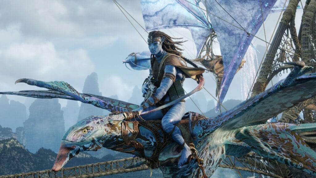 Leader Jake Sully, played by Sam Worthington, keeps watch as he rides high in the sky on his loyal banshee in AVATAR: FIRE AND ASH.  