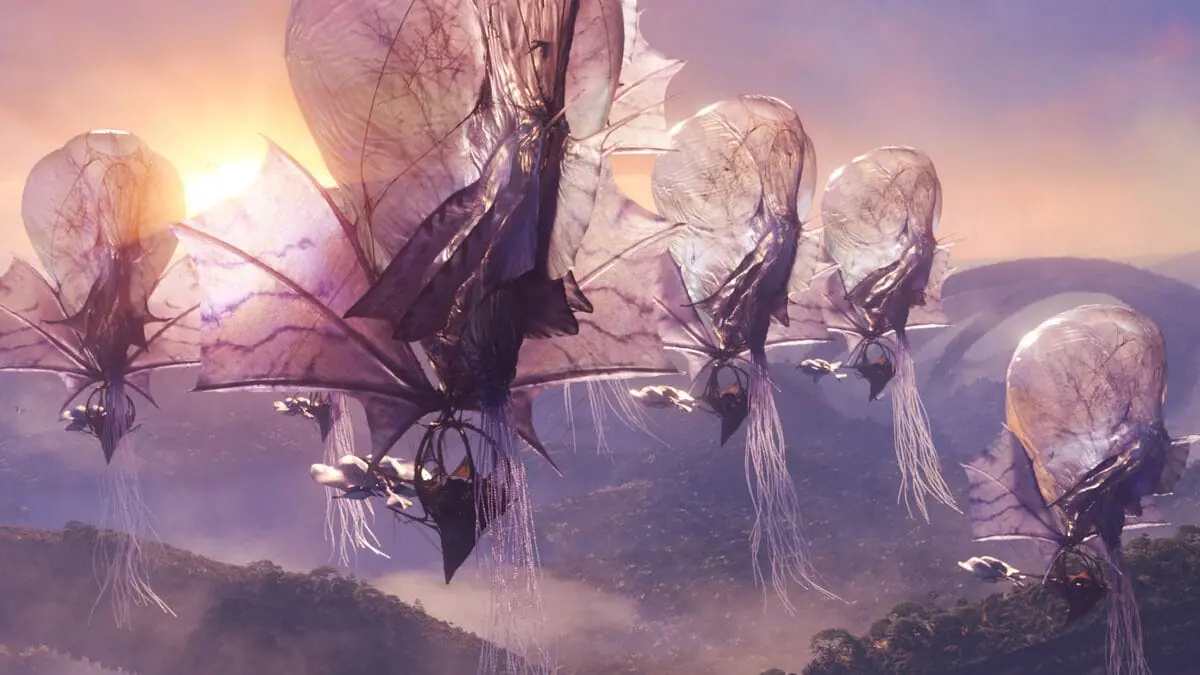 The floating jellyfish-like creature ships of the Na'vi Wind Traders look gorgeous in the skies of Pandora against a beautiful sunset in James Cameron's AVATAR: FIRE AND ASH. 