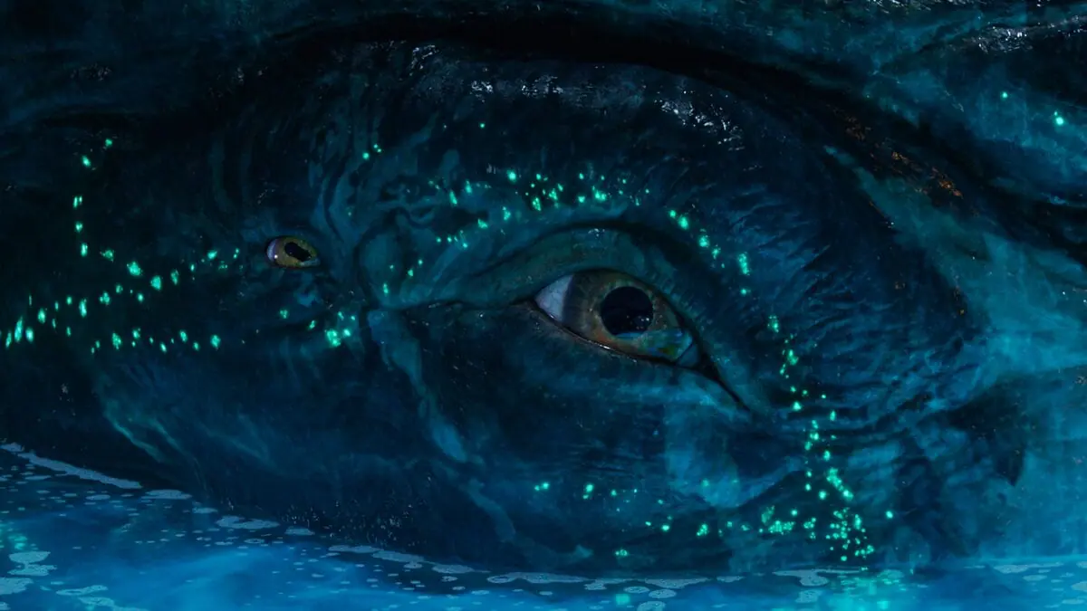 An emotional close-up of the two right side alien eyes of Payakan the outcast whale-like Tulkun from Jim Cameron's AVATAR: FIRE AND ASH.