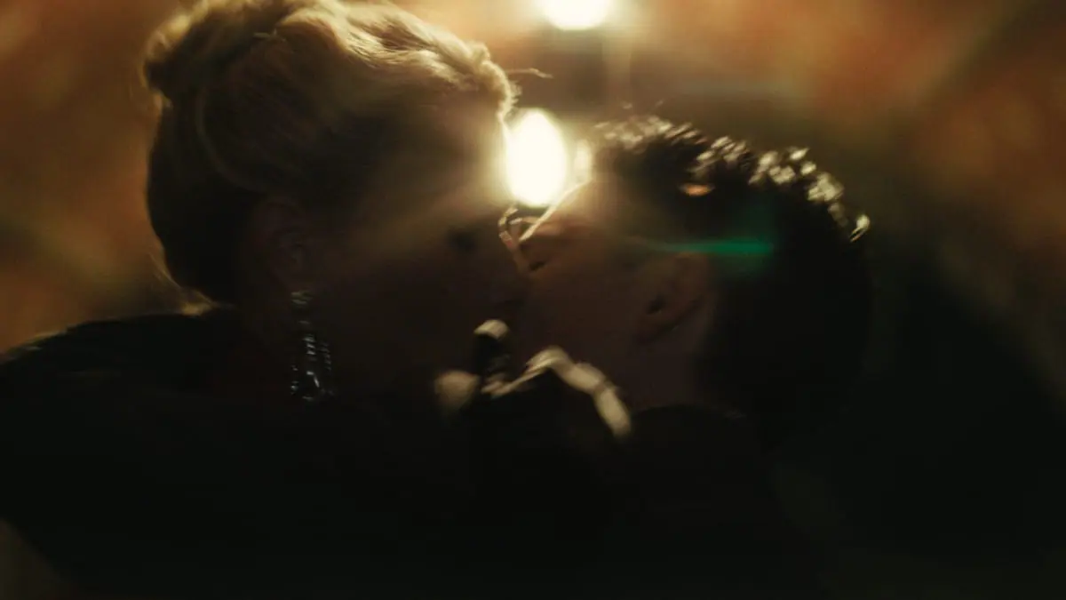 Gwyneth Paltrow and Timothée Chalamet share a romantic kiss together inside a dim tunnel in Grand Central Park in the 1950s-set sports drama MARTY SUPREME.