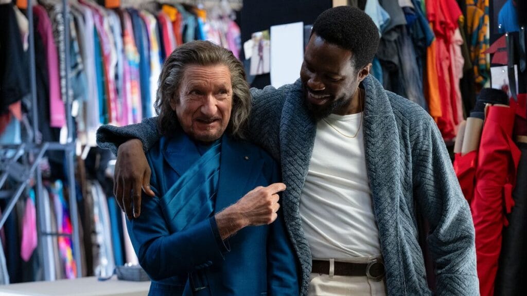 Ben Kingsley and Yahya Abdul-Mateen II star as Trevor Slattery and Simon Williams embracing each other with a friendly hug in the WONDER MAN series on Disney+.