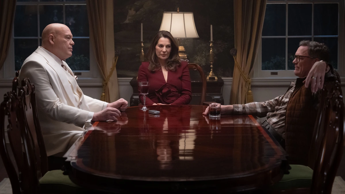Mayor Wilson Fisk, his wife Vanessa Fisk, and a new villain named Mr. Charles played by Matthew Lillard have a mysterious dinner meeting in DAREDEVIL: BORN AGAIN Season 2. 