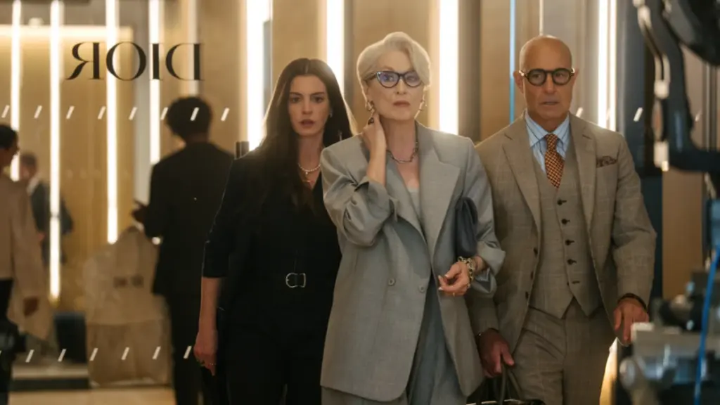 Anne Hathaway, Meryl Streep, and Stanley Tucci look distressed yet chic as they strut down the halls of Dior for an important business meeting in THE DEVIL WEARS PRADA 2.