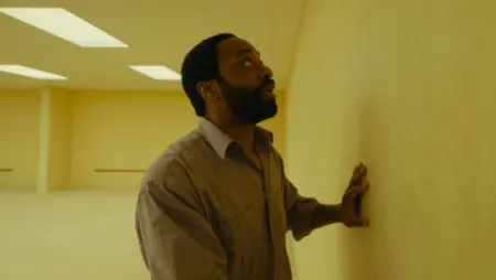 ‘Backrooms’ Review – Kane Parsons Successfully Brings Liminal Space Horror to the Mainstream Chiwetel Ejiofor looks terrified as he presses his hands against a yellow wall and tries to escape the barren dimension of the Backrooms in the A24 movie.