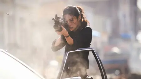 South Korean actress Jung Ho-yeon stars as rookie copy Sung-ae shooting at alien monsters in an epic shot from Na Hong-jin's HOPE.