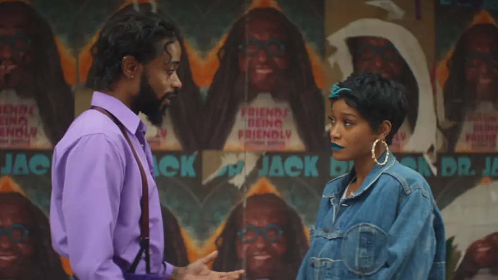 Keke Palmer reluctantly has a conversation with a soul-sucking cunnilingus demon played by LaKeith Stanfield wearing a purple dress shirt in I LOVE BOOSTERS. 