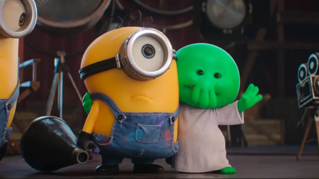 The new Minion with combed hair James meets the evil yet adorably small green Cthulhu-like demon Goomi in the animated sequel MINIONS & MONSTERS.