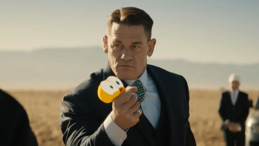 John Cena as the evil lawyer Buddy Crane chokes Tweedy Bird with one single hand in the live-action/animated Looney Tunes movie COYOTE VS. ACME. 
