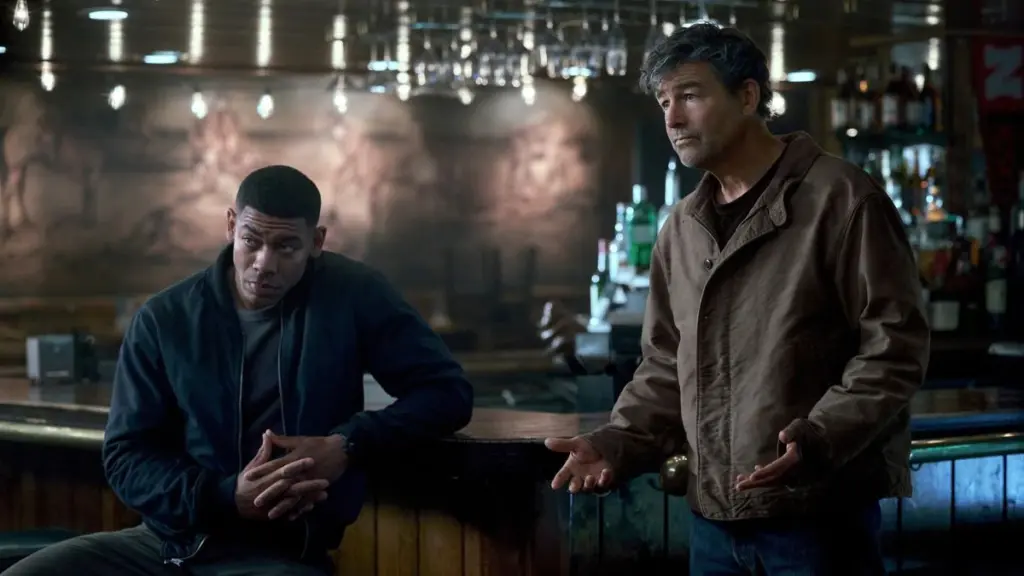 Aaron Pierre and Kyle Chandler star as Green Lanterns John Stewart and Hal Jordan investigating a crime scene in HBO's LANTERNS.